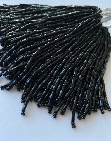 Free Australia-wide shipping.  Discounts on bulk orders.  Quality Bead Dropper with 50 strings per bunch.  Handmade bead droppers using glass Preciosa Beads and strong thread for confidence on the dance floor.  These beautiful bead droppers come in over 30 colours 