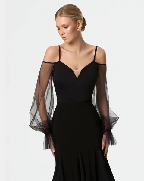 Free Australia-wide Shipping.  Best price worldwide with tracking
The Melanie Bodysuit in classic black is crafted for those who appreciate sophistication and femininity. Featuring airy organza puff sleeves, it adds a touch of drama, perfectly accentuating the lines of your arms as you dance. An impeccable choice for ballroom dance, where every gesture tells a story.
Hipster bottom
Removable cups
Made of the high quality biflex