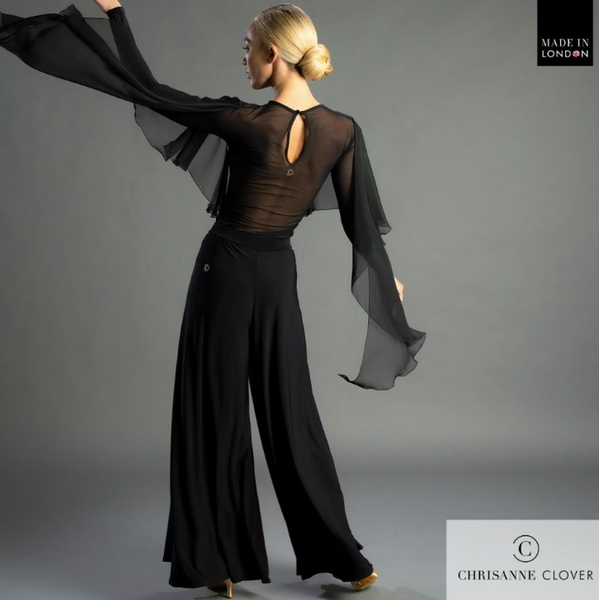 FREE AUSTRALIA-WIDE SHIPPING.; Best price worldwide with tracking.
The Anya palazzo trousers exude both elegance and sophistication, resembling a ballroom skirt while featuring side splits on both legs that enhance your leg line. The long tie waistband offers versatility, allowing you to secure it at the back, front, or side according to your preference.