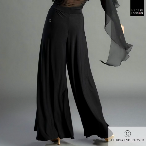 FREE AUSTRALIA-WIDE SHIPPING.; Best price worldwide with tracking.
The Anya palazzo trousers exude both elegance and sophistication, resembling a ballroom skirt while featuring side splits on both legs that enhance your leg line. The long tie waistband offers versatility, allowing you to secure it at the back, front, or side according to your preference.