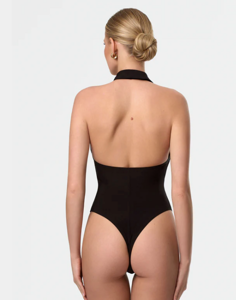 Free Australia-wide Shipping.  Best price worldwide.
The Martha Bodysuit blends minimalism and style effortlessly. With its sleeveless polo-style collar, it highlights the shoulders and neckline, creating a feminine and confident look. A versatile choice for dancers who value both functionality and polished design in their wardrobe.
String bottom
Removable cups
Made of the light and stretchy fabric