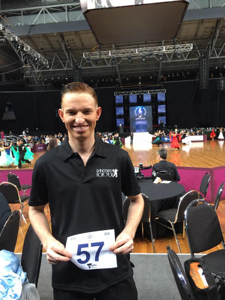 best selling breatheable, dri wear, moisture removing, moisture wicking fabric unisex polo t shirt with collar worn by Brodie barden dancesport dance practice shirt