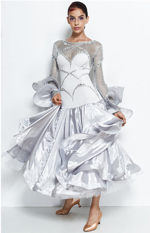 Junior & Youth ballroom dress, in a spectacular silver shade, light pearl chiffon combined with silver metallic upper mesh top and Crystal Clear sew on and glued on Swarovski crystals. Special frilled sleeves decorated with spiralling crystals.  Available on order in any other colour combination and size.  Australian owned and run business here in Perth - personal service, experience, dedication.
