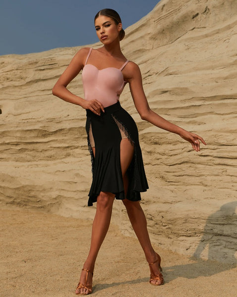 Free Australia-wide Shipping.  Best Price Worldwide.  Best Selling Latin Skirt!.  Our Wunder Under Skirt is sure to give your look an instant chic update. This style features a side cross tie up detailing and beautiful cut out with tube fringe. Pair it with our Deep V Bodysuit for the look we love.