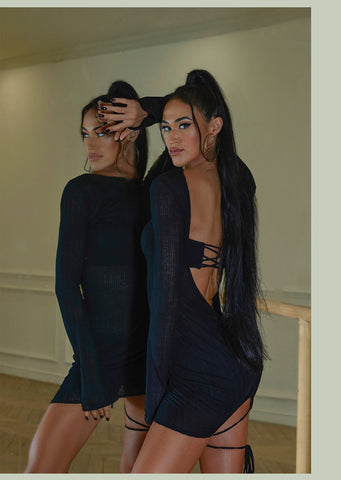 Free Australia-wide Shipping - Best price guaranteed worldwide.  This is our exquisite all-black one-piece Latin dance dress which is the epitome of elegance and versatility. Crafted with adjustable straps and drawstrings, minimalist garment can be worn on both sides, allowing you to experiment with different looks.