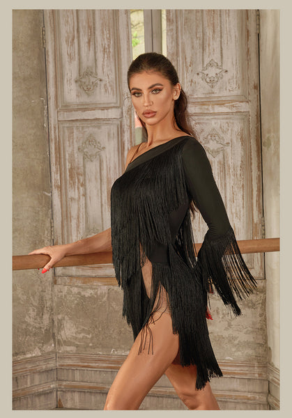 Free Australia-wide Shipping.&nbsp; Best price worldwide with tracking.


Master the art of modern design and effortless elegance with Nosta Fringe Dress.&nbsp;
This stunning piece features eye-catching multi-layered fringe that adds texture and movement, ensuring you turn heads wherever you go. The half-shoulder design, complemented by a one-sided long sleeve trimmed with delicate fringe details, introduces a playful dynamism. With an open back to enhance your shape and double side slits for a leg-lengthen