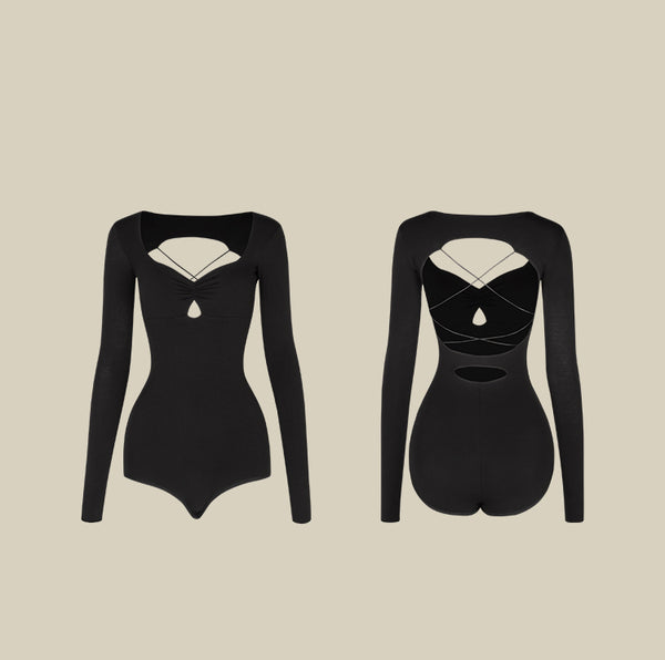 Free Australia-wide Shipping - best price worldwide.&nbsp;&nbsp;

The East Field Twilight Long Sleeve Bodysuit is ideal for fall and winter seasons. The deep V-neckline flatters the neck, while the open-back design brings a touch of playful charm. Crisscross straps at the back enhance its elegant yet energetic style. Designed for versatility, this bodysuit ensures you shine in every performance.