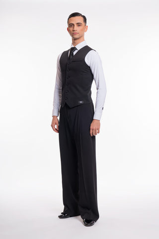 Free Australia-wide shipping. Best price worldwide with tracking.

RS Atelier Walter men's ballroom dance waistcoat in Black

Give your ballroom dance outfit a sharp, professional finish with the RS Atelier Walter waistcoat. Its classic button-front design makes an elegant layer for performance, special occasions, dance medal exams and DanceSport competition. Pair it with your ballroom shirt for a polished look as you step onto the floor.

Details
Classic men's dance vest and waistcoat in Black only
Button 