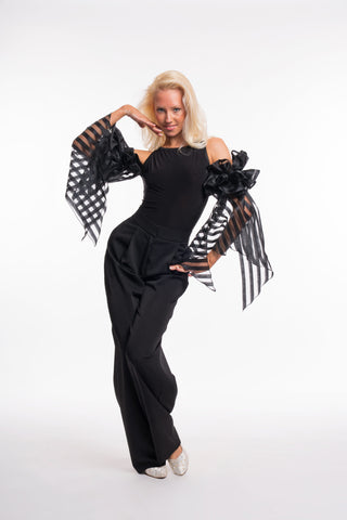 Free Australia-wide shipping. Great prices worldwide.

RS Atelier Zoe sleeveless dance bodysuit

Make a statement on the dance floor in the RS Atelier Zoe. This sleeveless bodysuit is finished with elegant ruffled arm floats for a distinctive ballroom look, suitable for lessons, practice, performance and special occasions.

Currently available in black or white. The striped version shown in the product photo is not currently available. Contact us by email to be notified if it becomes available.

Details
Sle