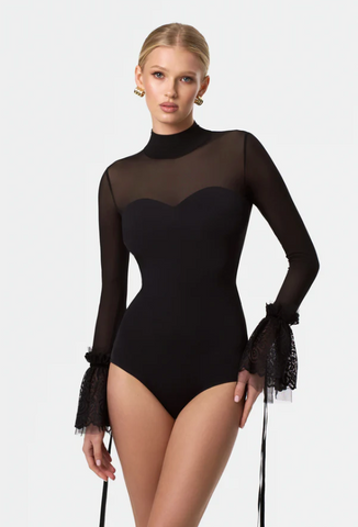 Free Australia-wide Shipping.&nbsp; Best price worldwide.


The Helene Bodysuit is the embodiment of modern elegance. Its sleek turtleneck design and statement sleeve details create a refined silhouette that commands attention. Ideal for ballroom dance, this bodysuit ensures you feel composed and empowered with every step.


Hipster bottom
Removable cups

Made of the high quality biflex
