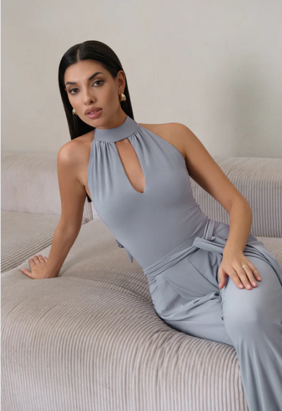 Free Australia-wide Shipping.&nbsp; Best price worldwide with tracking

The Helsa Bodysuit in a new soft grey colour exudes refinement and confidence. With smooth lines, an open back, and a flawless fit, it becomes an essential piece in every dancer's wardrobe. Pair it with the Mason Grey Trousers for a striking look and enjoy the compliments. Perfect for evening wear &amp; social dancing, clubbing wear paired with jeans or pants, ballroom &amp; latin dance practice, performance and recreational dancesport 