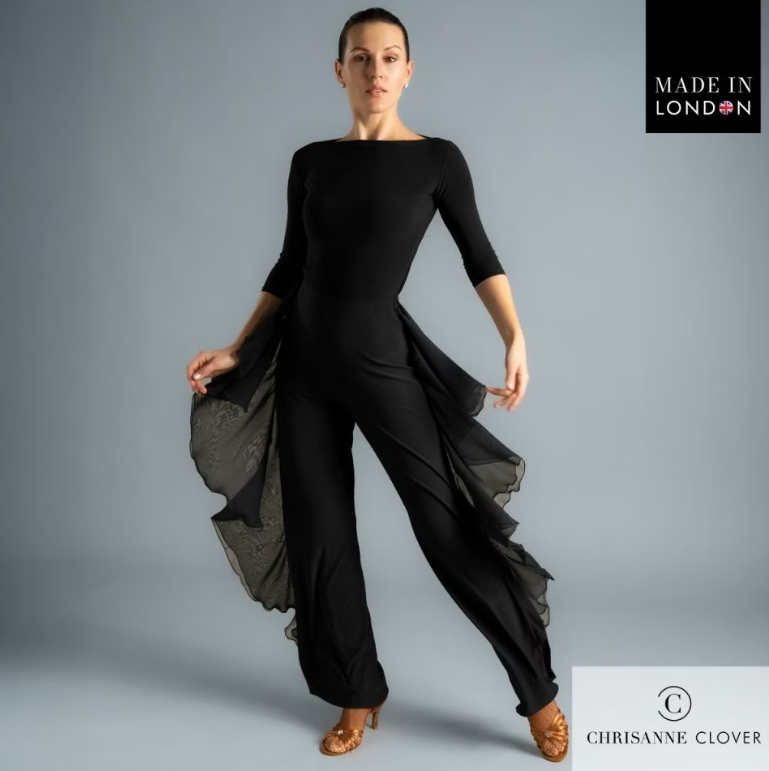 The Payton Trousers are designed for dancers who want style and movement combined. Featuring two layers of georgette frills placed along the side seams, these trousers create dazzling motion with every step. The frills are finished with a delicate roll hem for a refined touch, while the trousers themselves are crafted from premium stretch crepe and finished with an overlock hem for durability.

A crystallized Chrisanne Clover logo sits on the back left hip, adding a luxurious detail. Perfect for both ballro