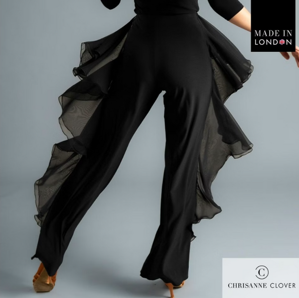 The Payton Trousers are designed for dancers who want style and movement combined. Featuring two layers of georgette frills placed along the side seams, these trousers create dazzling motion with every step. The frills are finished with a delicate roll hem for a refined touch, while the trousers themselves are crafted from premium stretch crepe and finished with an overlock hem for durability.

A crystallized Chrisanne Clover logo sits on the back left hip, adding a luxurious detail. Perfect for both ballro