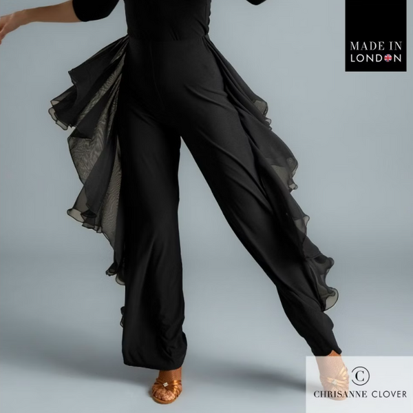 The Payton Trousers are designed for dancers who want style and movement combined. Featuring two layers of georgette frills placed along the side seams, these trousers create dazzling motion with every step. The frills are finished with a delicate roll hem for a refined touch, while the trousers themselves are crafted from premium stretch crepe and finished with an overlock hem for durability.

A crystallized Chrisanne Clover logo sits on the back left hip, adding a luxurious detail. Perfect for both ballro