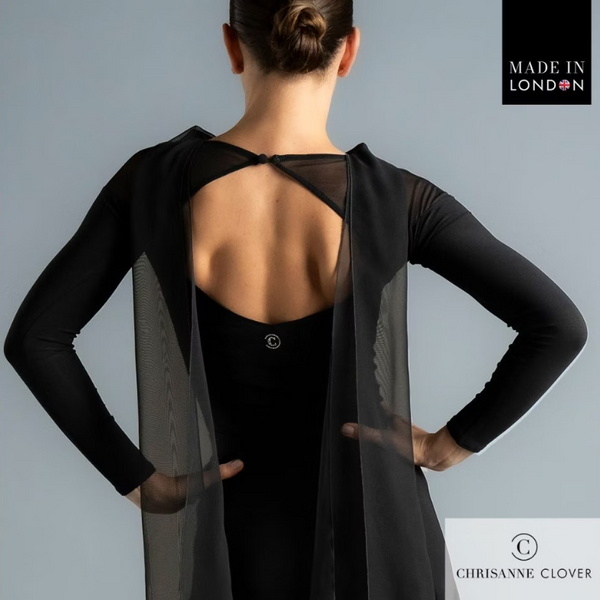 The Darcy Top is the epitome of elegance and movement, designed to make an impression both on and off the dance floor. Featuring a flowing georgette scarf detail that cascades gracefully down the back, this top adds dramatic flair to every turn.

The design combines a stretch net top piece that drops below the shoulder with a contrasting stretch crepe bodice and sleeves for a sophisticated layered look. A large diamond-shaped keyhole back fastens with a single covered button and is embellished with a brande