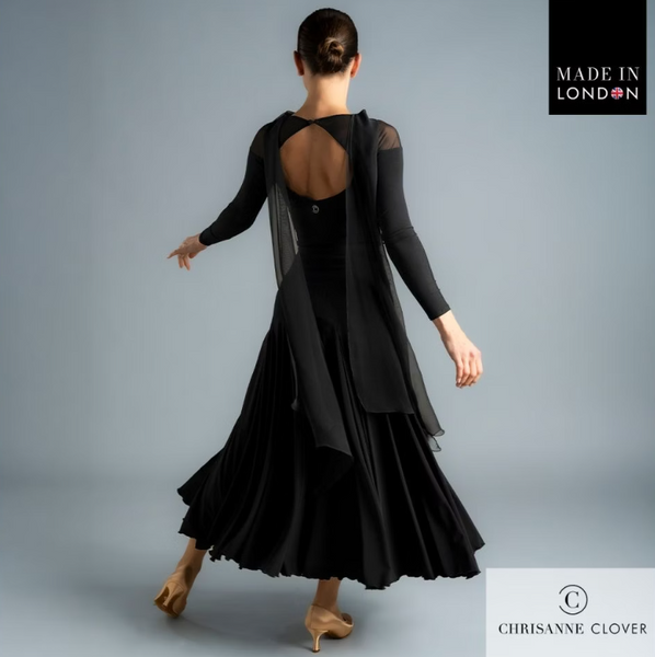 The Darcy Top is the epitome of elegance and movement, designed to make an impression both on and off the dance floor. Featuring a flowing georgette scarf detail that cascades gracefully down the back, this top adds dramatic flair to every turn.

The design combines a stretch net top piece that drops below the shoulder with a contrasting stretch crepe bodice and sleeves for a sophisticated layered look. A large diamond-shaped keyhole back fastens with a single covered button and is embellished with a brande