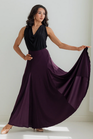 FREE Australia-wide Shipping | Best Price Worldwide

The Alexa Ballroom Skirt in Plum is an elegant stretch ballroom skirt featuring six inserts of beautiful, machine washable satin. A rich, deep plum tone that is dramatic and uniquely flattering on the dancefloor — an elegant piece for any ballroom or smooth dance, or even an evening out dancing! A wide, soft elastic waistband creates a seamless look and a supportive, comfortable feel that moves with you all night long.

Skirt Features:
Elegant stretch fab