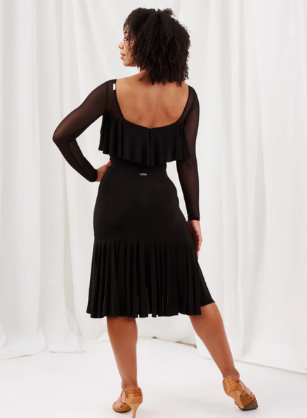 The Camilla Ruffle Skirt in Black is a simple, beautiful ruffled skirt that is perfect for just about anything. A wide elastic waistband allows for easy pull-on and a flattering waistline, while the full flared ruffle skirt provides plenty of graceful movement — whether you're on the dancefloor, at a social event, or simply out and about.

Skirt Features:
Full flared ruffle skirt for graceful, flowing movement
Wide elastic waistband — easy pull-on, flattering fit
Versatile classic black — perfect for dance 