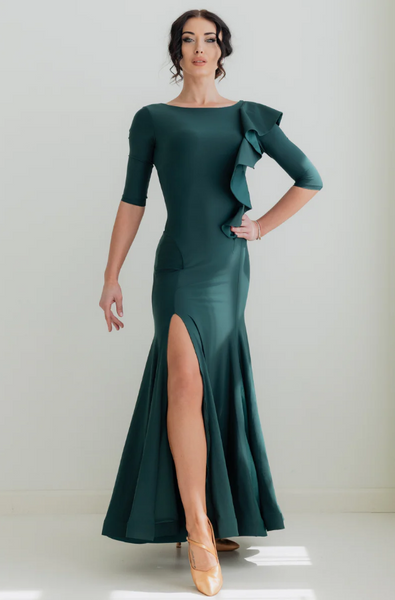 the Federica Ruffle Gown in Emerald Smoke is designed for dancers who know that presence is everything. Whether you're stepping onto the competition floor for your first DanceSport competition, performing at a showcase, or attending a formal evening event, this gown delivers effortless sophistication and graceful movement in equal measure.

A sweeping, wide skirt with delicate mesh inserts flows beautifully as you move, while the horsehair trim and cascading ruffle detail add layers of glamour that catch th