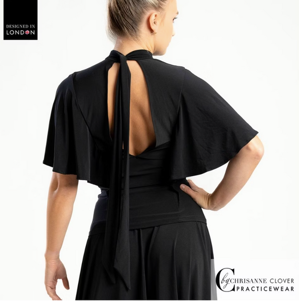 FREE AUSTRALIA-WIDE SHIPPING.&nbsp; Best price worldwide with tracking.


This beautiful high-neck dance top showcases a stylish necktie that gracefully drapes down the back, complemented by a striking keyhole design. The flared cape sleeves are crafted in a V-neck style at the front, elegantly resting over the arms, allowing for a fluid range of motion during dance.

Designed for movement, this top pairs perfectly with the Clio and Capella Ballroom skirts from our collection, creating a stunning ensemble f