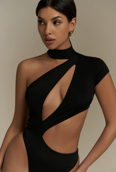 Free Australian Shipping - Best price worldwide.

Unleash your boldest self with the Gina Bodysuit. In classic black, this stunning piece features sexy cut-outs and an asymmetric design, perfect for making a striking impression. Crafted from our signature soft and elastic fabric, it ensures you feel as amazing as you look. Whether at the studio or out on the town, the Gina Bodysuit will make you feel empowered and unforgettable.


String bottom
Snap button closure at the hem
Snap&nbsp;button closer at the n