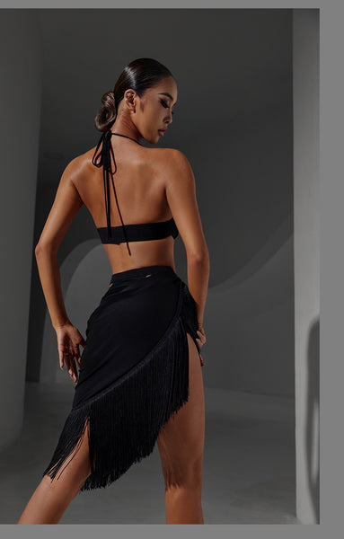 Free Australia-wide Shipping.  Best Price Worldwide.  This alluring dance skirt adds a unique flare to the dance floor. With a high slit and fringes, the skirt features a sexy cutout hip detail to show off your moves.  Flattering and feminine, this skirt is perfect for making a bold statement on the dance floor. Enjoy the confidence and the attention you’ll receive as you provide a visual entertainment experience. Perfect for both practice and competition,