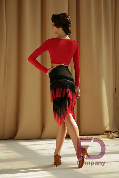 Stylish Latin Fringe Skirt with a straight silhouette, built-in pants, elastic waist with 4cm stitched belt, herringbone-shaped undercuts, long graduated fringe for a stunning look and plenty of movement!   Made with Stretch Crepe & Stretch Velor.  Perfect for practice, social dancing, competition or performance