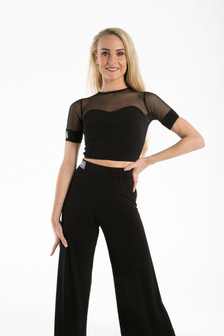 A dance top with great versatility to compliment all the skirts, leggings and trousers throughout our ranges.  Comfortable and smart this top features a key hole back with fastener and is available from small child Size 2 through to Adult size 7.  Matching skirts, wraps and trousers run across the range for Children through to Ladies.