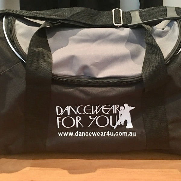 Free Aust-wide Shipping.  Worldwide shipping calculated at checkout.  With embroidered DW4U logo as per photo of grey & black bag.  Various Solid Colours are available in this style.  This practical large-size sports & travel bag features a large central compartment with U shaped, double zippered opening to fit all your practice-wear, lunch box, books and gear inside plus right side mesh pocket