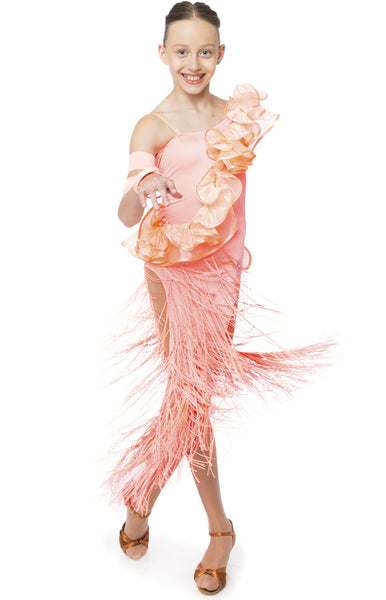 Fancy Coral-Peach coloured Junior Latin Dress made with quality Lycra, Pleated Pearl Chiffon Frills - single sleeve and bare back for a perfect Latin Look.  The skirt is decorated with long fringes.  All bracelets included.    This stunning, fully completed, ready to wear Junior & Youth Latin DanceSport Competition Dress can be created in any colour and size. 