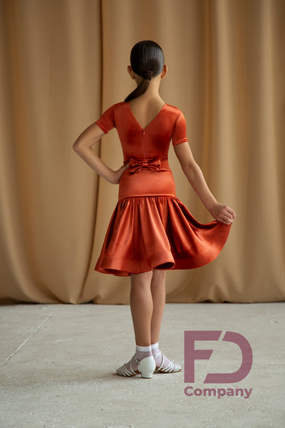 FREE AUSTRALIA-WIDE SHIPPING.  Best price worldwide guaranteed.  A beautiful Juvenile Dance Dress based on a leotard with short sleeves, round neckline, V-shaped back neckline with a fastener.  The skirt features a stitched belt and regilene sewn into the hemline for a perfect shape.  Made using shining velour.  